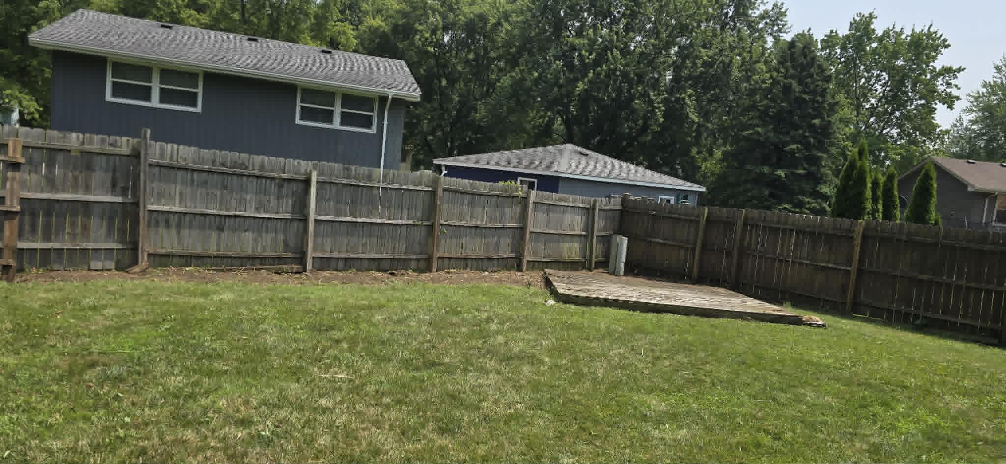 Weeds cleared along fence